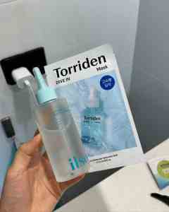 ALT text: Fresh bananas, flour, baking powder, coconut oil, vanilla extract, eggs, and sea salt flakes.