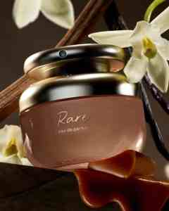 Luxury perfume bottle with white flowers and elegant gold details for sophisticated scents.