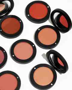 luxe beauty gift beauty stacks in different makeup shades on white background from Adorn Cosmetics.