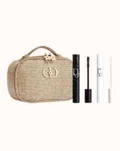 Dior mascara as a luxury gift for women who have everything on a light pink background with mascara primer.