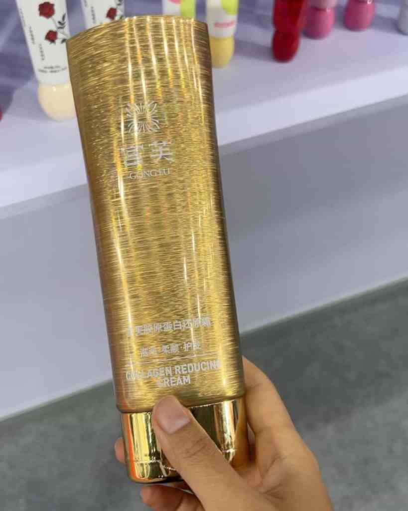 Golden collagen reducing cream packaging for skincare and anti-aging.