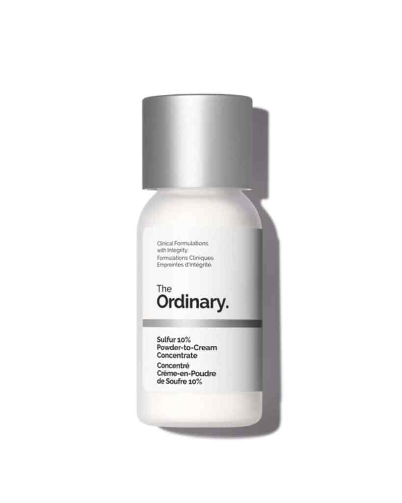 A white bottle of The Ordinary Sulfur 10% Powder-to-Cream Concentrate with minimalist design.