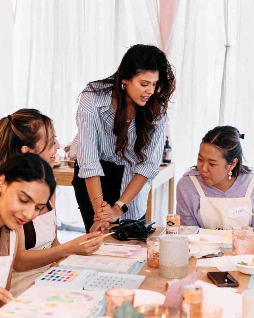 Friendly team collaborating on branding strategy.