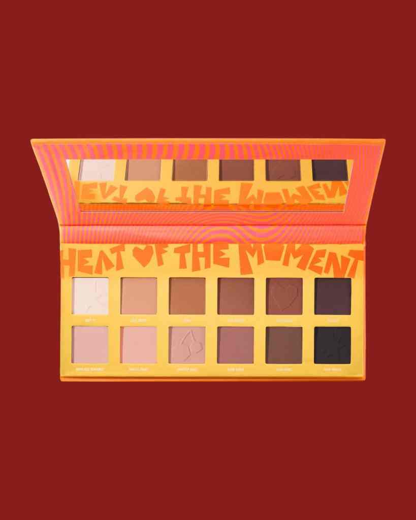 Bright orange, pink, and brown eyeshadows with playful packaging for creative beauty projects.