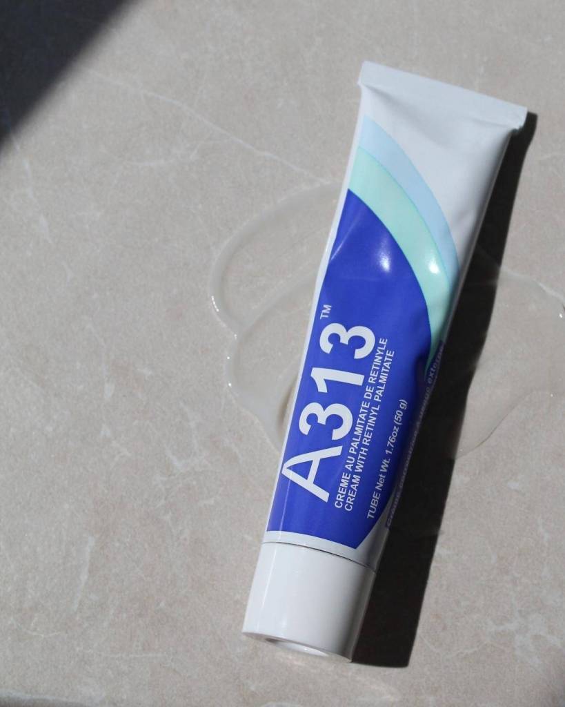 A close-up of A313 cream tube, a topical treatment for skin irritation and inflammation relief.